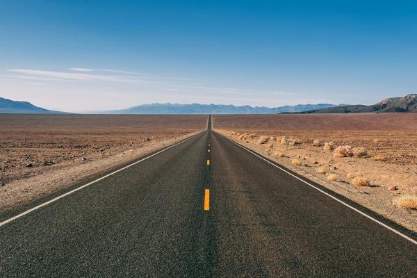 From towering sandstone cliffs, to geothermal wonders, to North America’s tallest peak, here’s how to hit the road through several U.S. National Parks